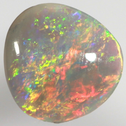 SOLID CRYSTAL OPAL Moving colour always, bright candy red over green and gold
